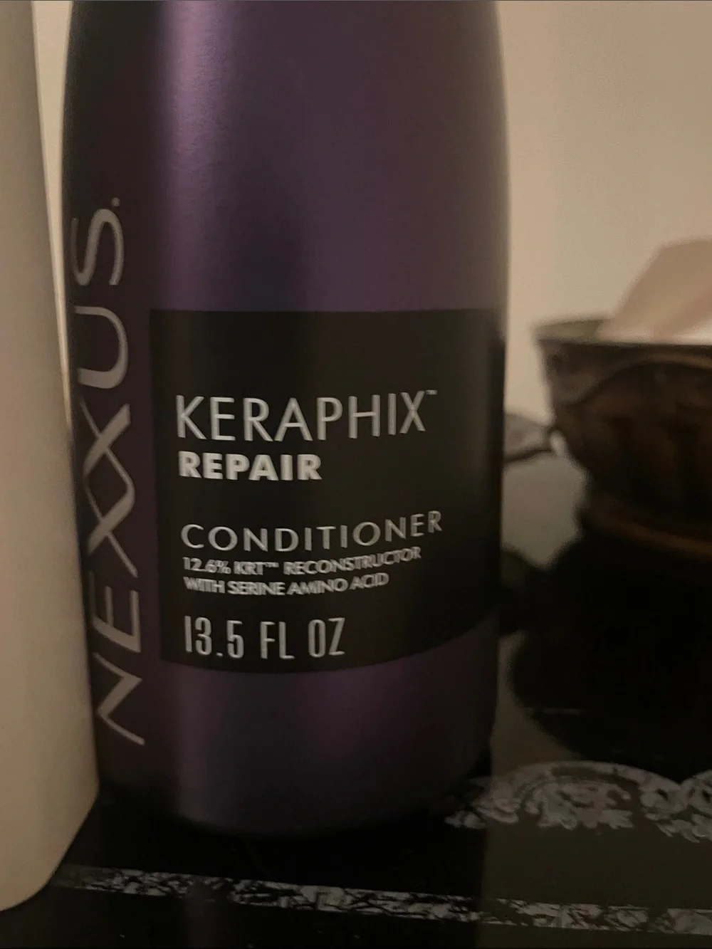 Drunk Elephant Cocomino Glossing Shampoo and Nexxus Keraphix repair
